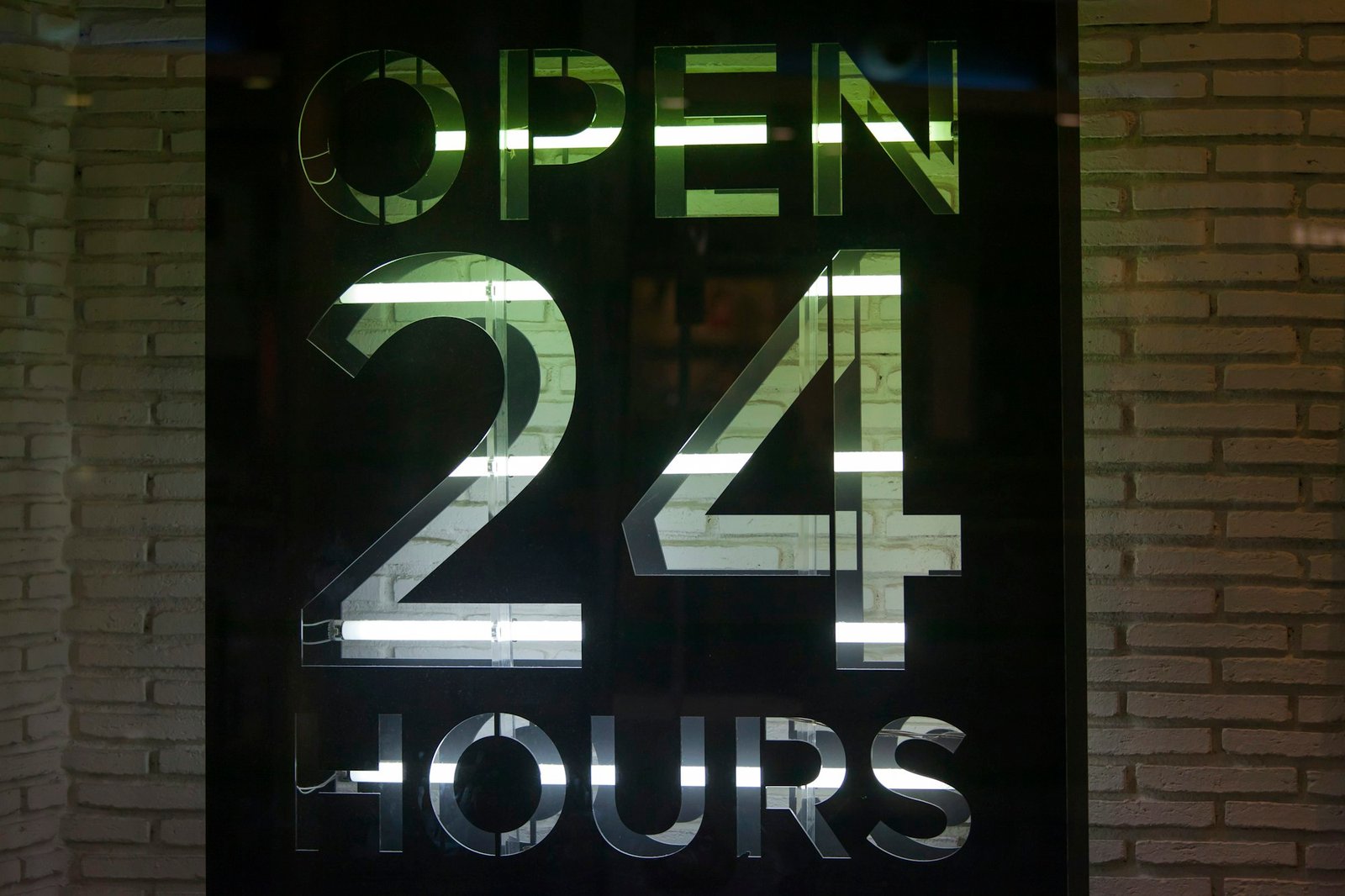 Sign in the store ‘Open 24 Hours, small business